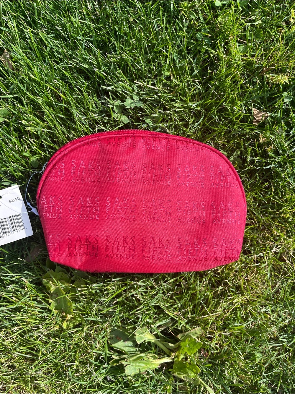 Saks Fifth Avenue Red Embossed Logo Cosmetic Pouch